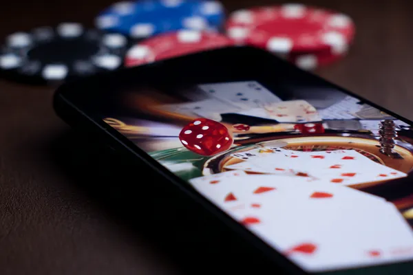 A glamorous woman holding casino chips in a neon-lit environment, representing the premium online casino atmosphere of FOOTBALL BET.